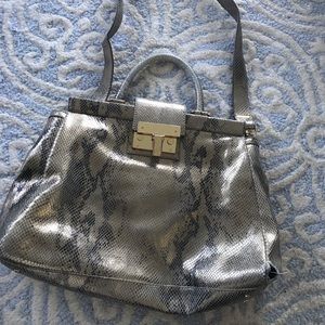 Oversized Tory Burch purse, metallic and chic!